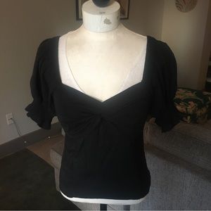 Black puff sleeve twistfront top